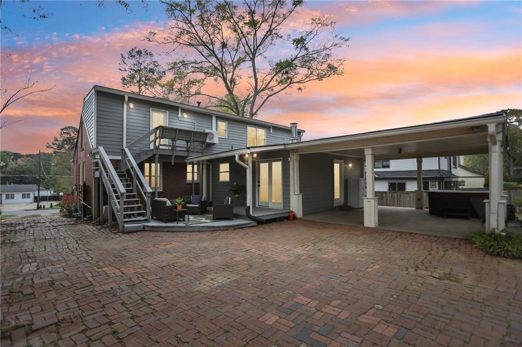 3224 Kensington Road Avondale Estates, GA 30002 - Photo 46 of 59 a view of a house with backyard porch and sitting area