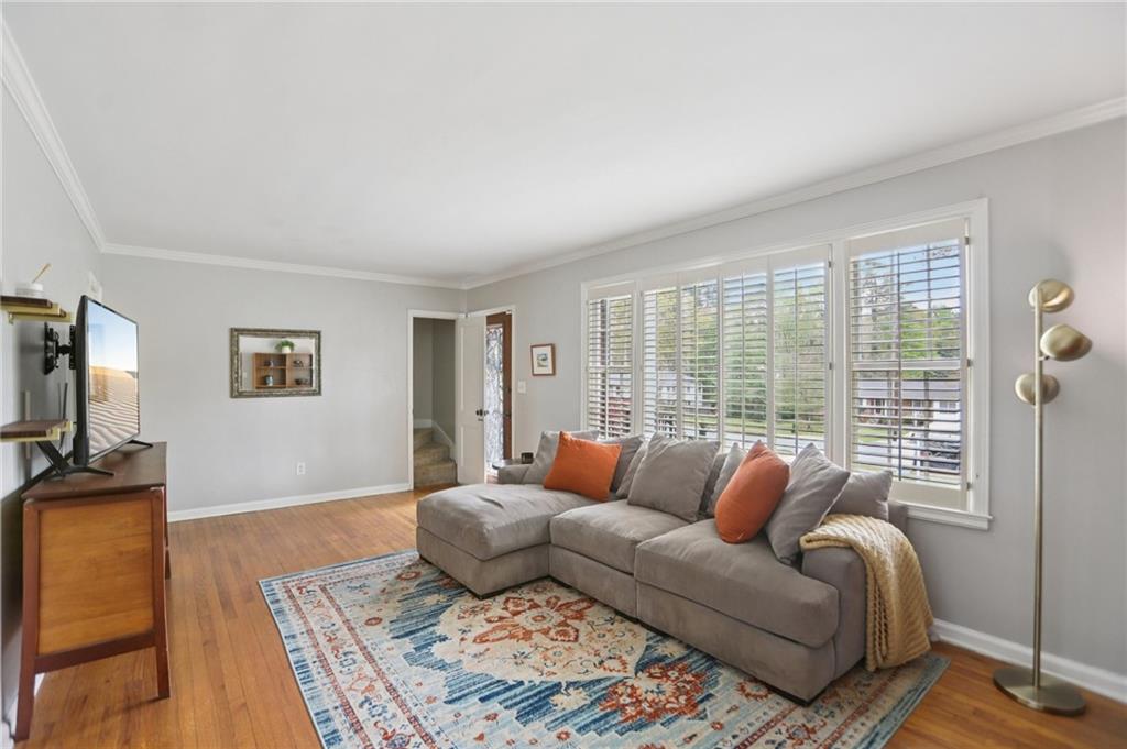 3224 Kensington Road Avondale Estates, GA 30002 - Photo 5 of 59 a living room with furniture and a flat screen tv