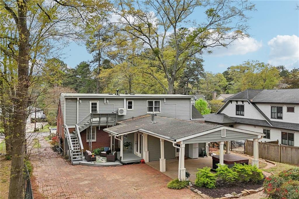 3224 Kensington Road Avondale Estates, GA 30002 - Photo 54 of 59 a view of a house with a yard