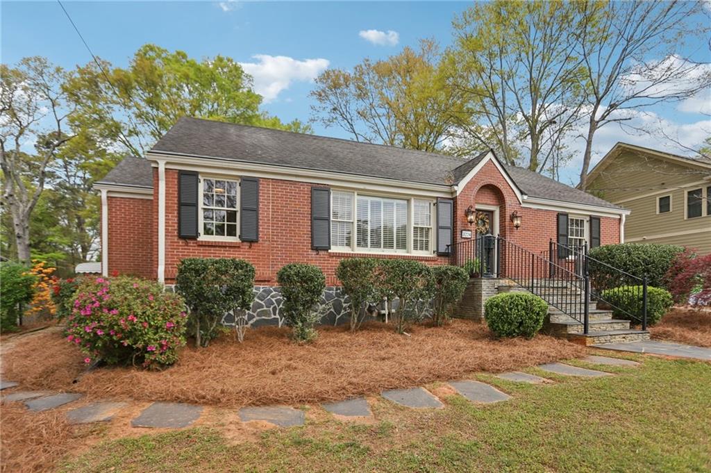 3224 Kensington Road Avondale Estates, GA 30002 - Photo 57 of 59 a front view of a house with garden