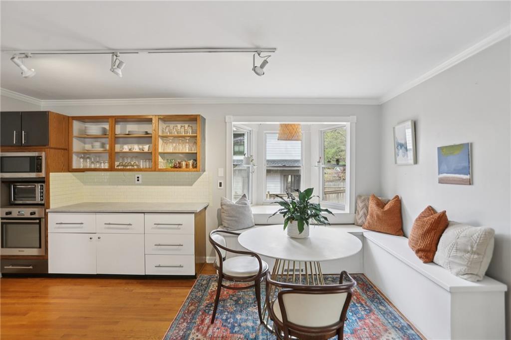3224 Kensington Road Avondale Estates, GA 30002 - Photo 7 of 59 a dining room with furniture and window
