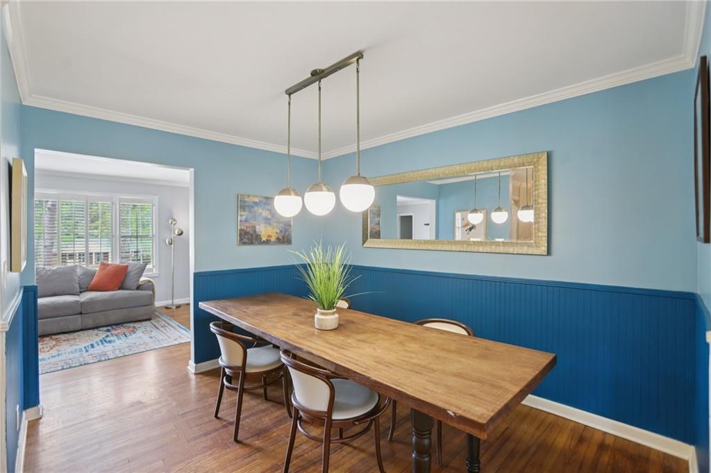 3224 Kensington Road Avondale Estates, GA 30002 - Photo 8 of 59 a view of a dining room with furniture window and wooden floor