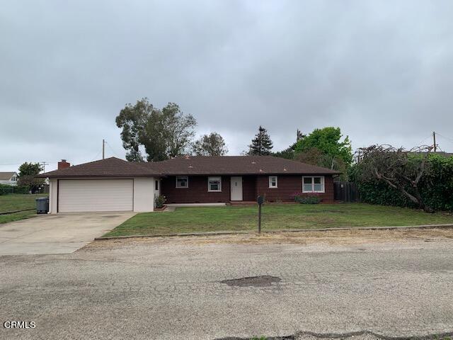1561 Little Farms Road Oxnard, CA 93030 - Photo 3 of 37 a view of a yard in front of a house with large trees