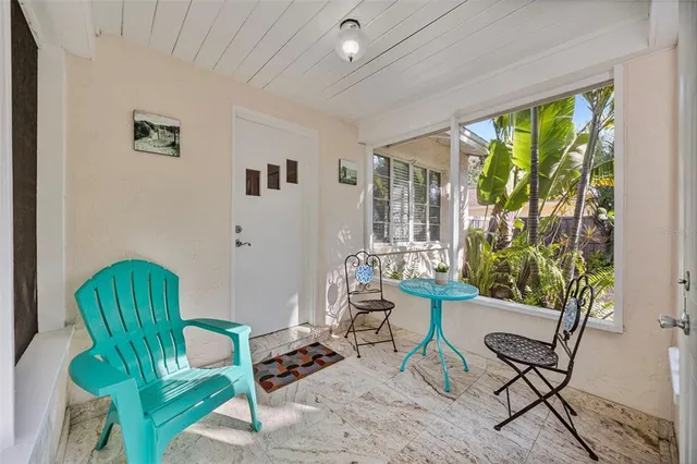 a kitchen with stainless steel appliances granite countertop a refrigerator a stove and a sink