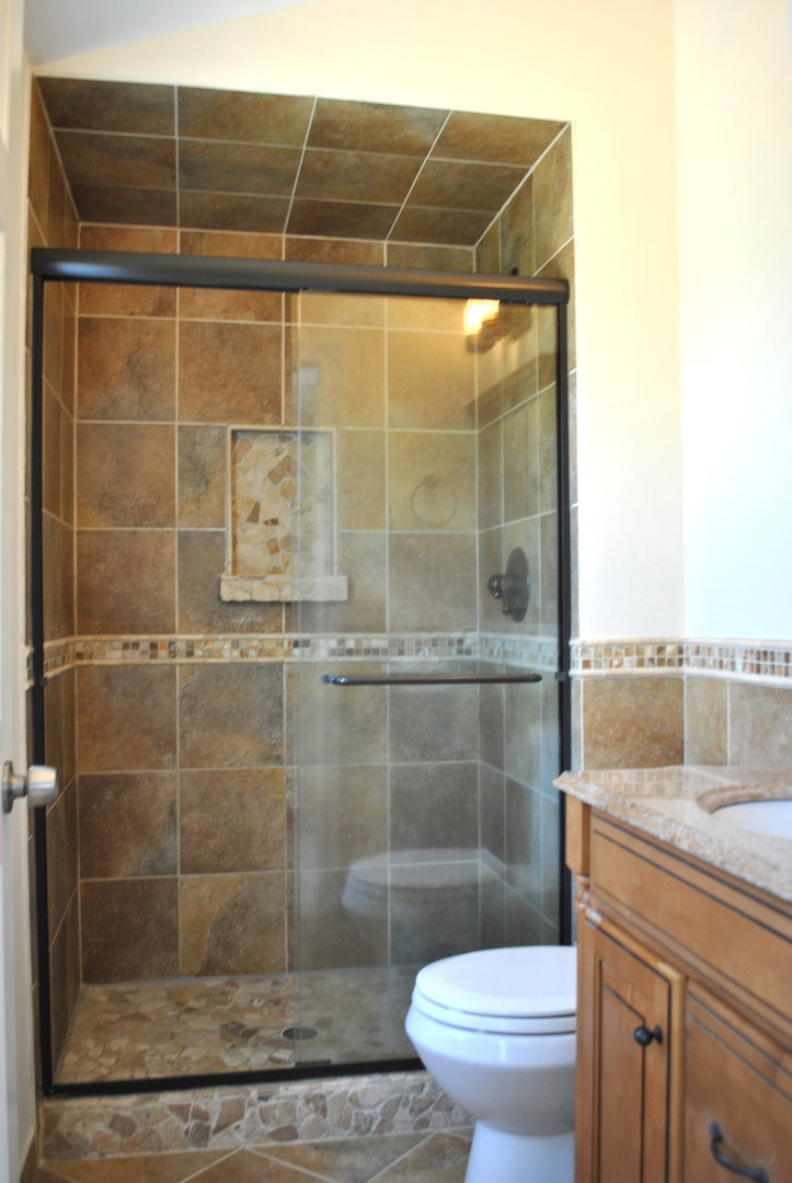 29W128 Wagner Road Naperville, IL 60564 - Photo 22 of 25 a bathroom with a shower and a toilet