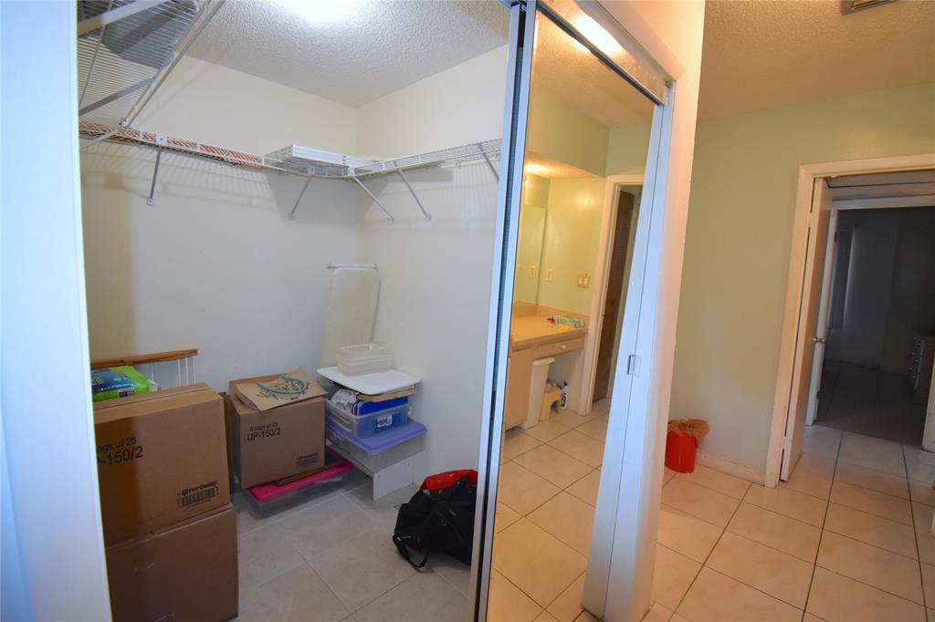 1713 Northwest 73rd Avenue, Unit 34 Plantation, FL 33313 - Photo 12 of 26 a view of utility room