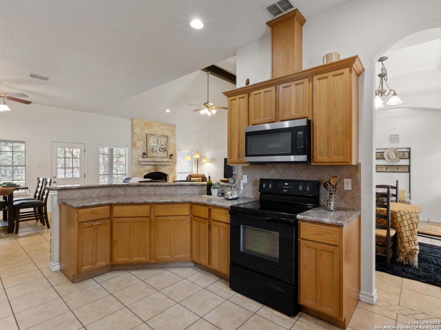 604 Guadalupe Drive Spring Branch, TX 78070 - Photo 15 of 54 a kitchen with a sink cabinets and stainless steel appliances
