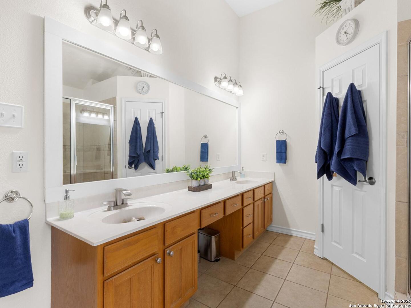 604 Guadalupe Drive Spring Branch, TX 78070 - Photo 16 of 41 a bathroom with a sink vanity and mirror