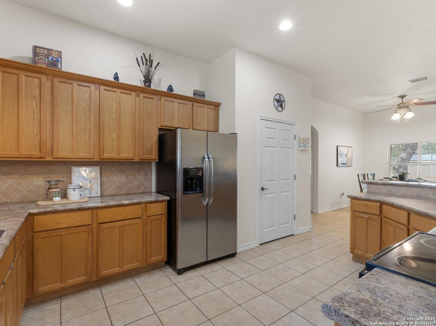 604 Guadalupe Drive Spring Branch, TX 78070 - Photo 17 of 54 a kitchen with stainless steel appliances a refrigerator sink and cabinets