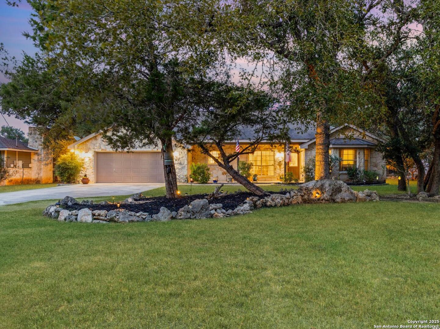 604 Guadalupe Drive Spring Branch, TX 78070 - Photo 2 of 54 a view of a house with a backyard