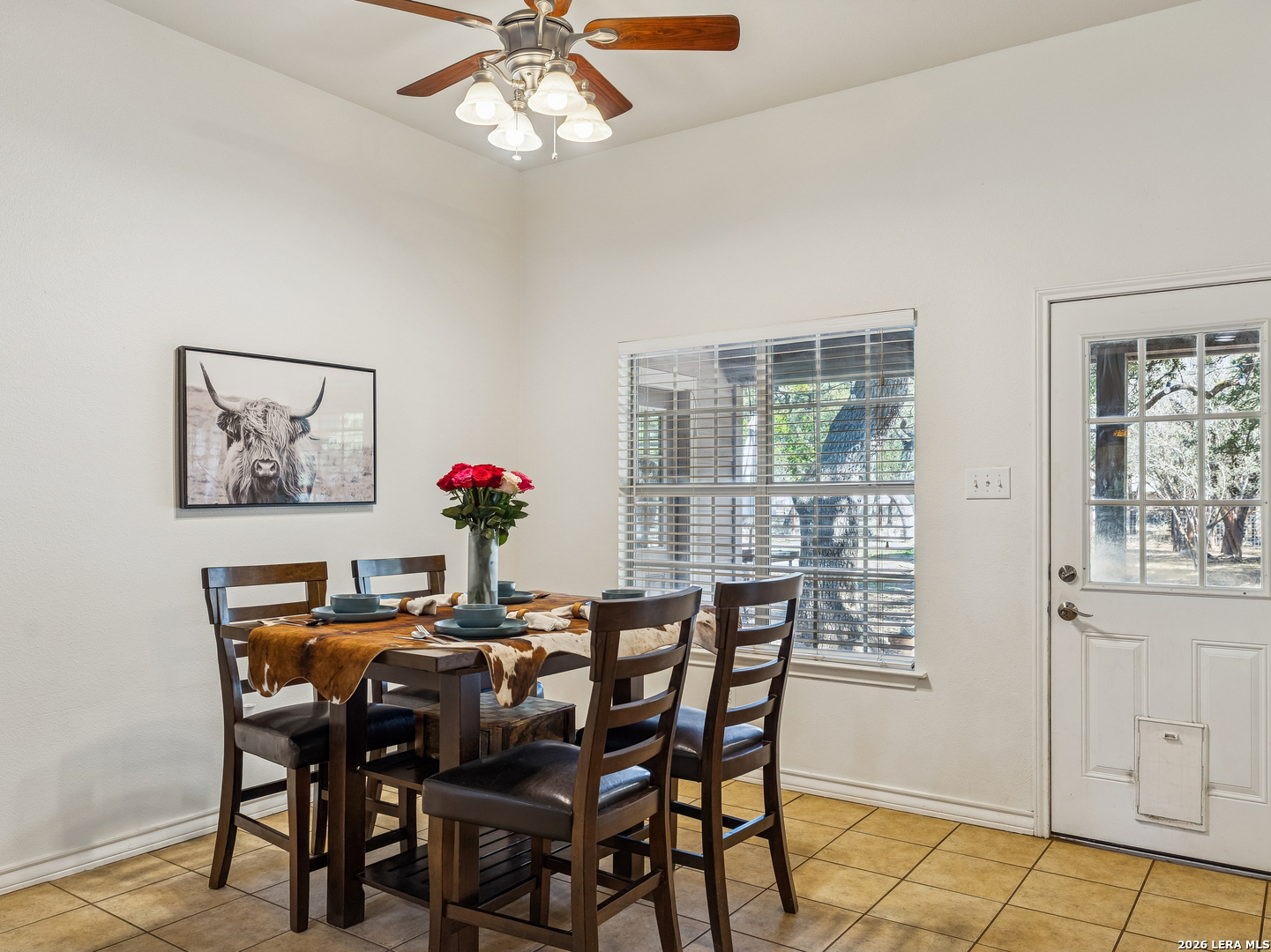 604 Guadalupe Drive Spring Branch, TX 78070 - Photo 22 of 54 a dining room with furniture potted plants and wooden floor