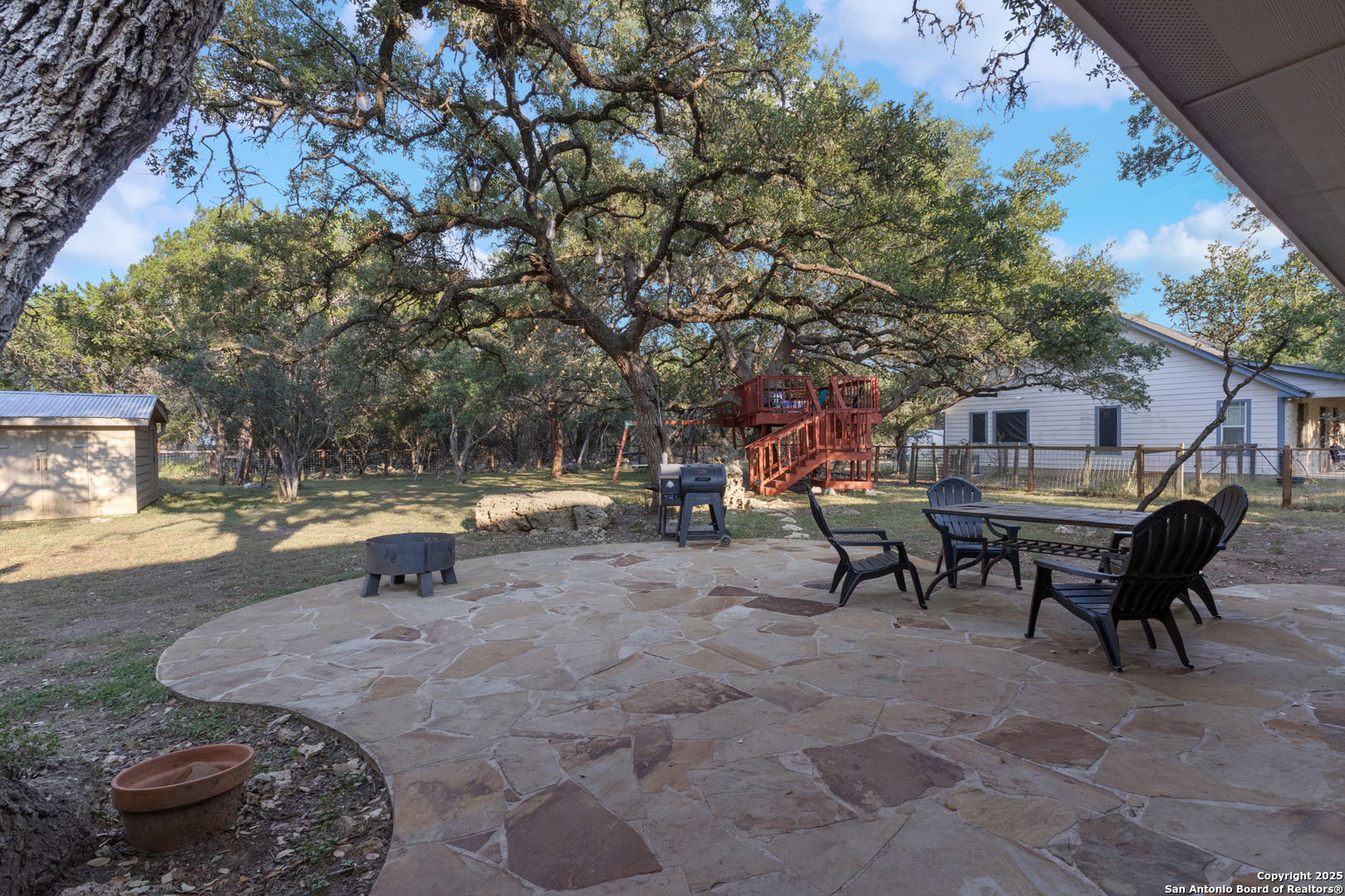 604 Guadalupe Drive Spring Branch, TX 78070 - Photo 25 of 41 a view of a backyard with table and chairs