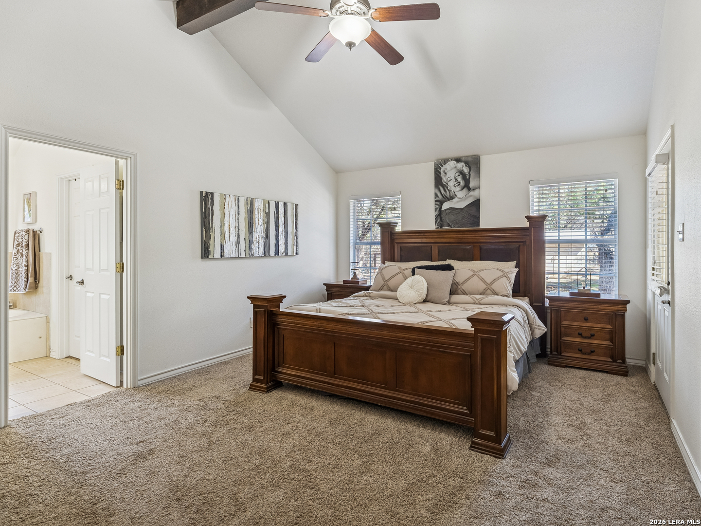 604 Guadalupe Drive Spring Branch, TX 78070 - Photo 25 of 54 a bedroom with a bed and a chandelier