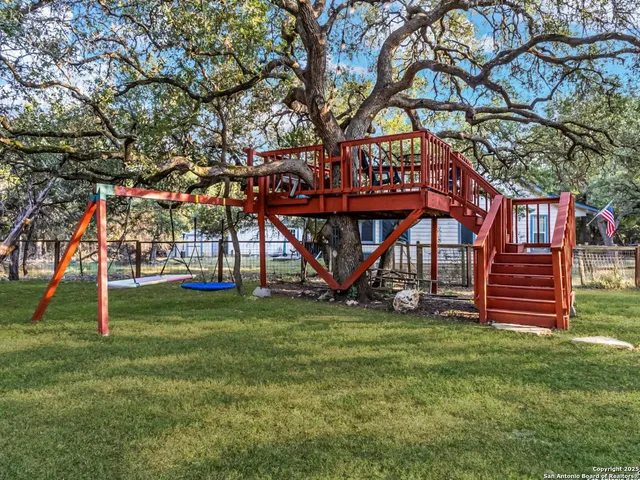 a view of a backyard with a small house
