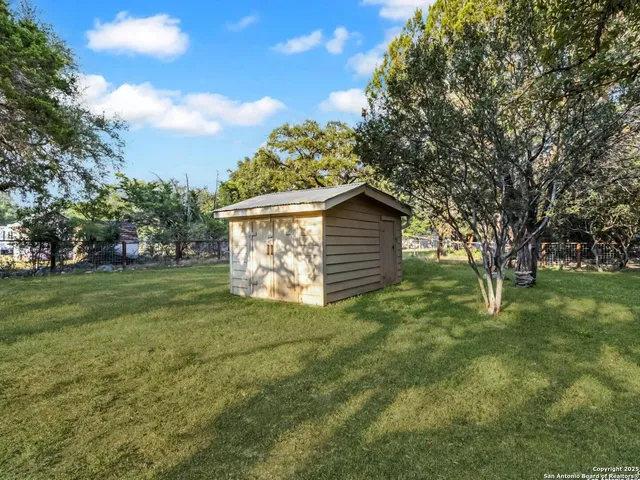 a fire hydrant in the middle of a field