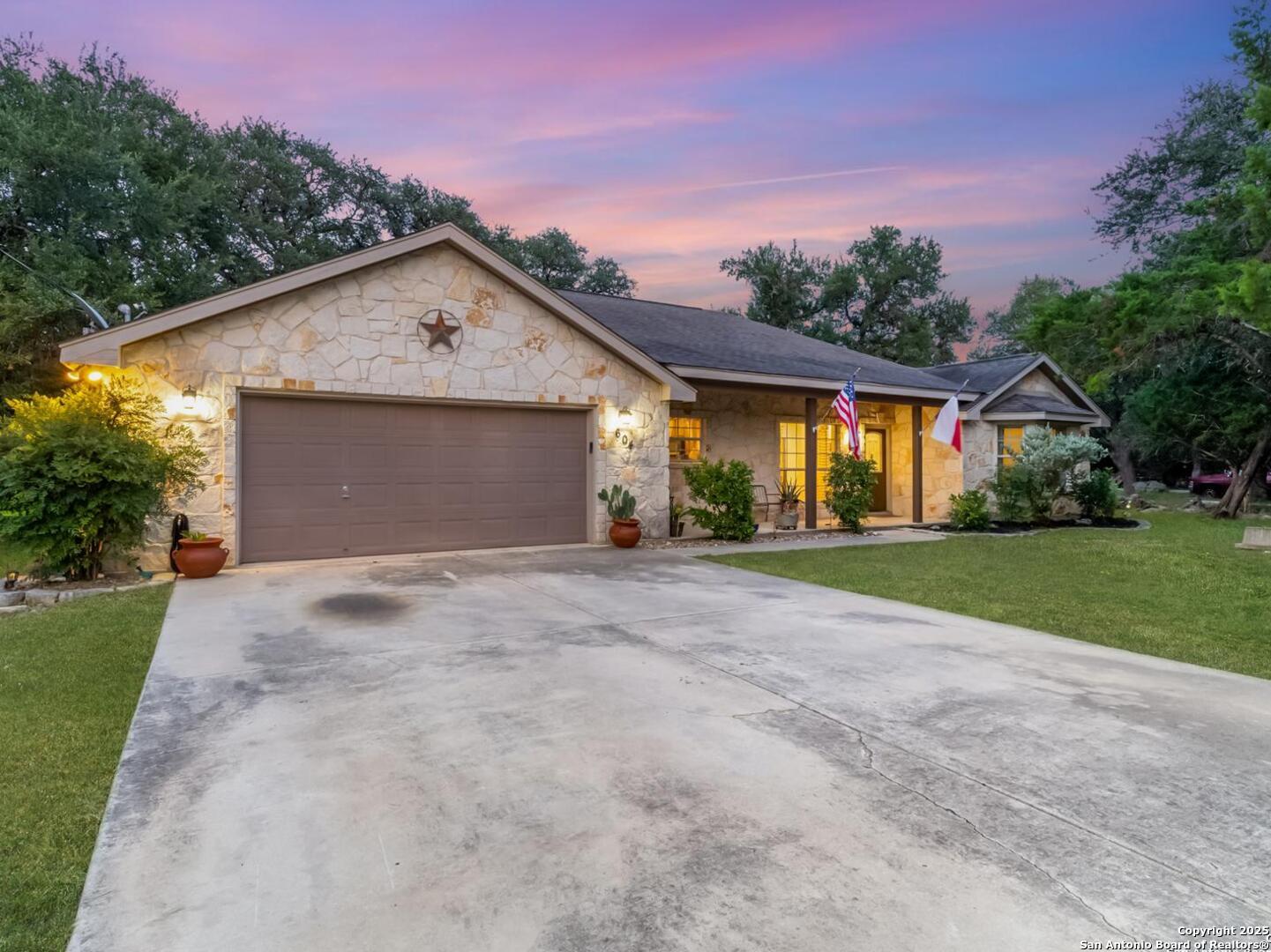 604 Guadalupe Drive Spring Branch, TX 78070 - Photo 3 of 41 a view of a house with backyard and garden
