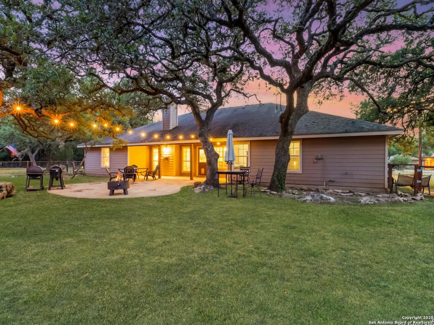 604 Guadalupe Drive Spring Branch, TX 78070 - Photo 31 of 41 a view of a backyard with large trees