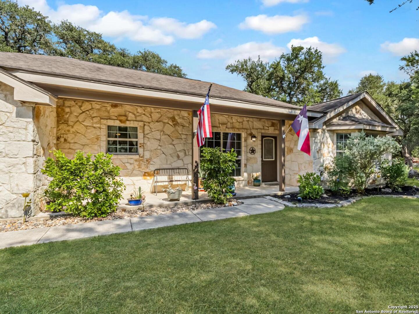 604 Guadalupe Drive Spring Branch, TX 78070 - Photo 5 of 54 a view of a house with a yard porch and sitting area
