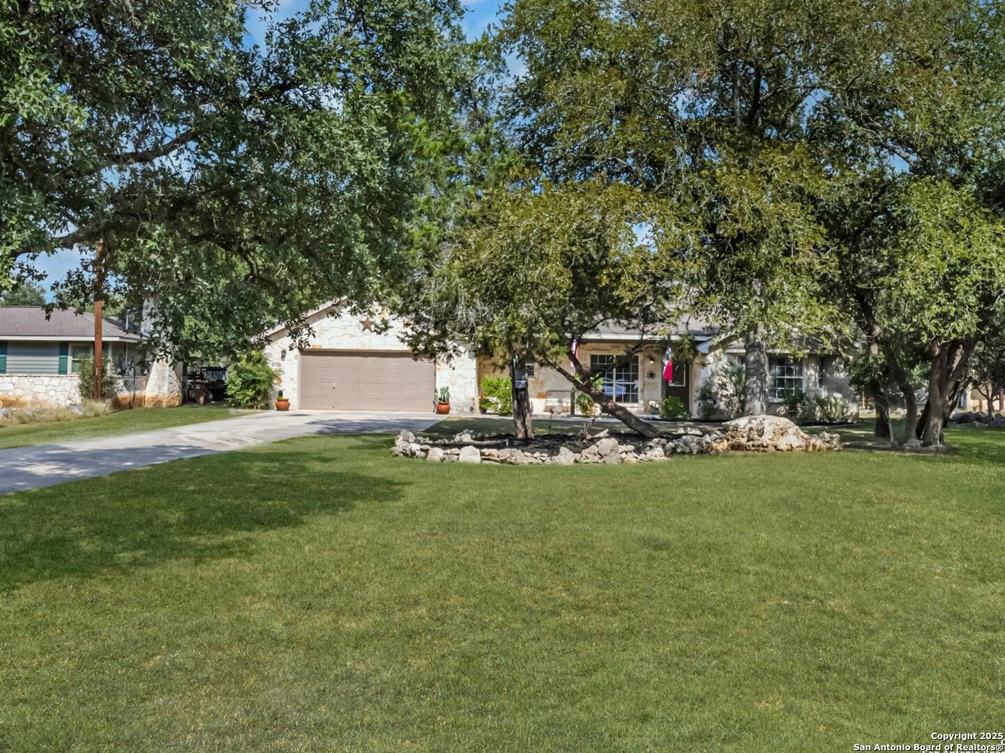 604 Guadalupe Drive Spring Branch, TX 78070 - Photo 54 of 54 a view of a house with a yard and a tree