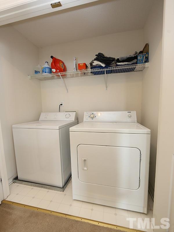 4205 Toccopola Street Raleigh, NC 27604 - Photo 20 of 24 a utility room with dryer and washer
