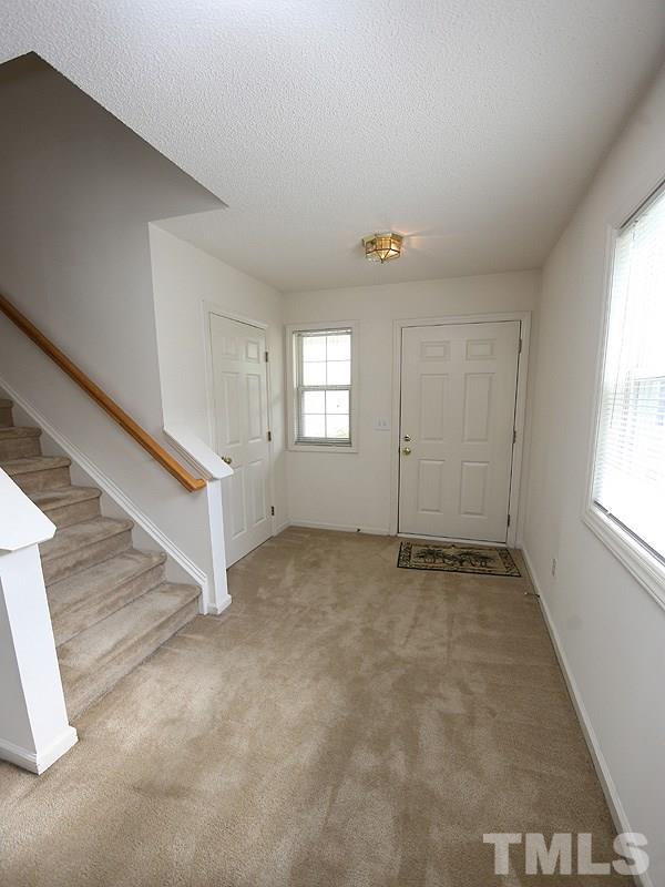4205 Toccopola Street Raleigh, NC 27604 - Photo 8 of 24 an empty room with windows