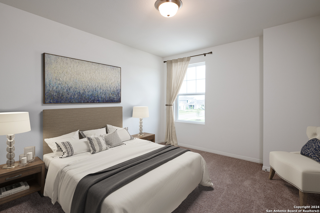 1428 Almeda Road Seguin, TX 78155 - Photo 14 of 17 a bedroom with bed and window