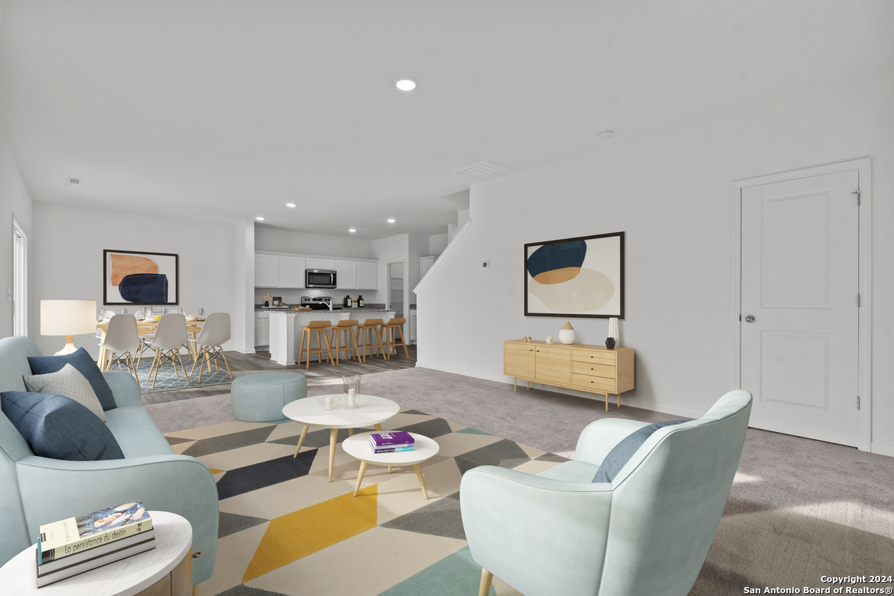 1428 Almeda Road Seguin, TX 78155 - Photo 10 of 17 a living room with furniture and a wooden floor