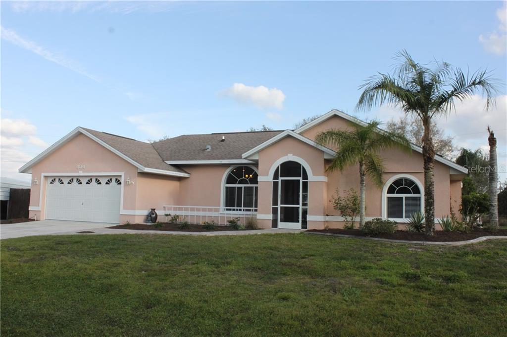 Front of  Block/Stucco home built in 1997.