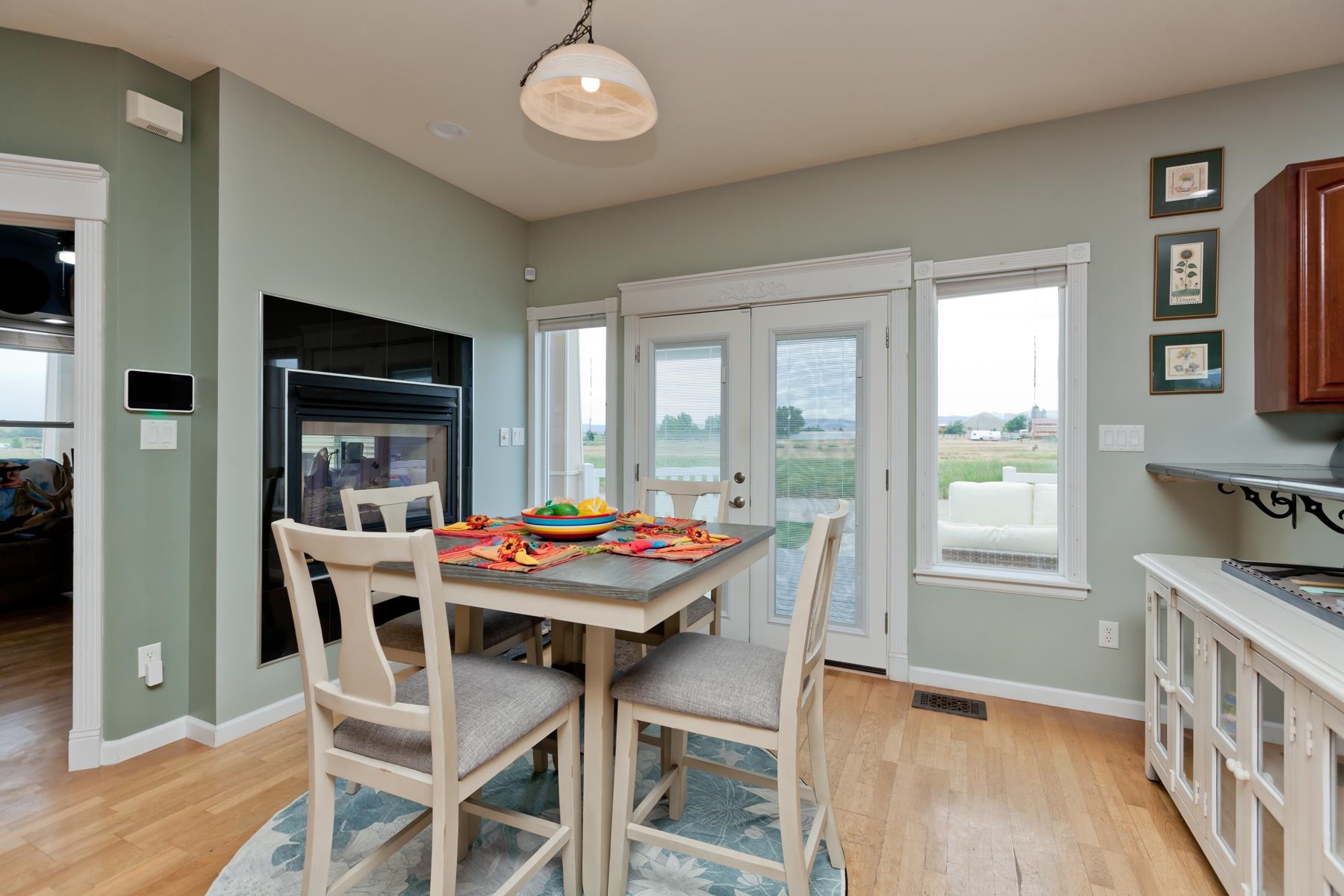 1815 O Road Fruita, CO 81521 - Photo 19 of 42 a dining room with furniture window and wooden floor