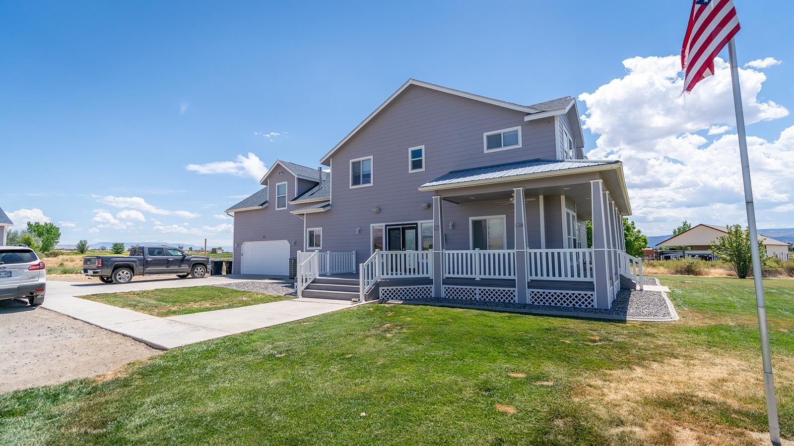 1815 O Road Fruita, CO 81521 - Photo 2 of 42 a view of a house with a yard porch and sitting area