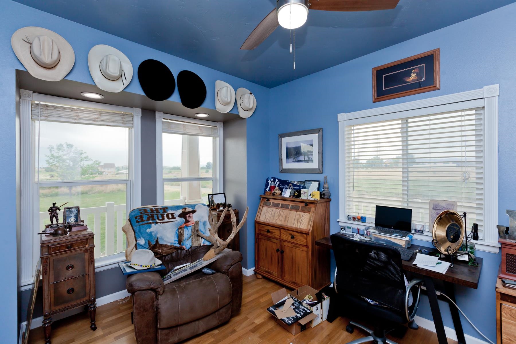 1815 O Road Fruita, CO 81521 - Photo 22 of 42 a view of a workspace with furniture and a window