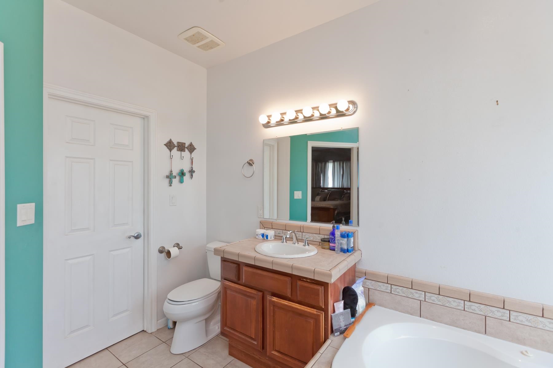 1815 O Road Fruita, CO 81521 - Photo 30 of 42 a bathroom with a sink and a mirror