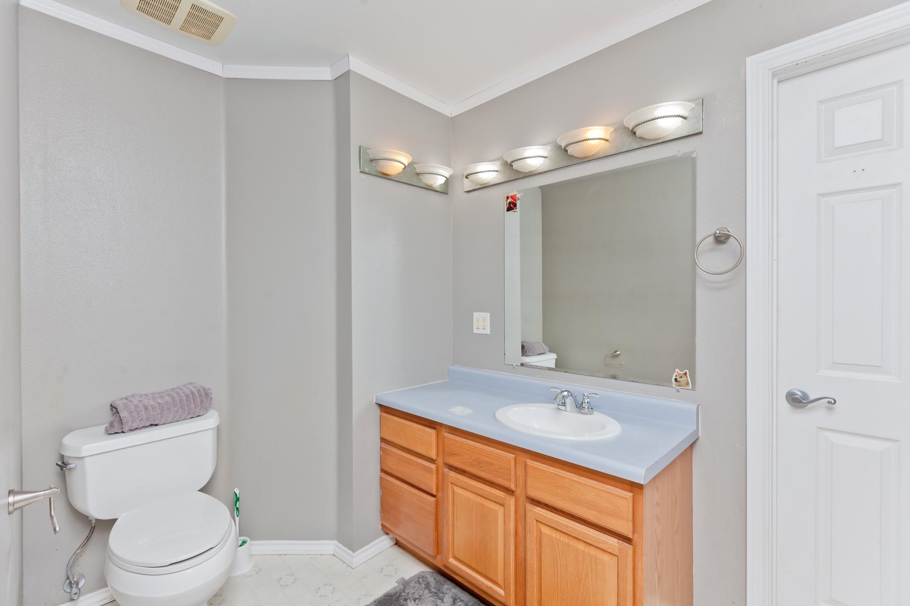 1815 O Road Fruita, CO 81521 - Photo 35 of 42 a bathroom with a sink a toilet a mirror and shower