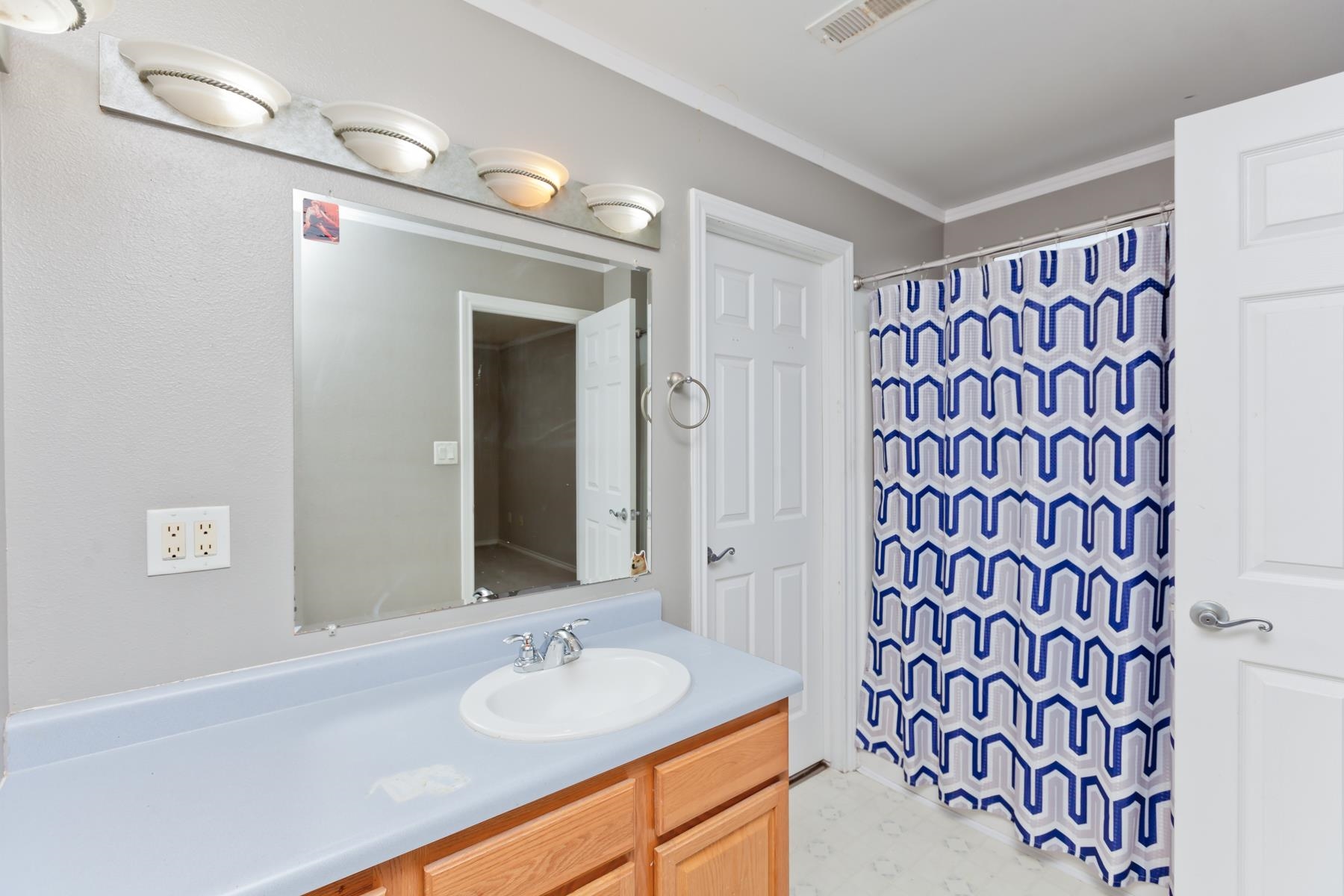 1815 O Road Fruita, CO 81521 - Photo 36 of 42 a bathroom with a sink and a mirror