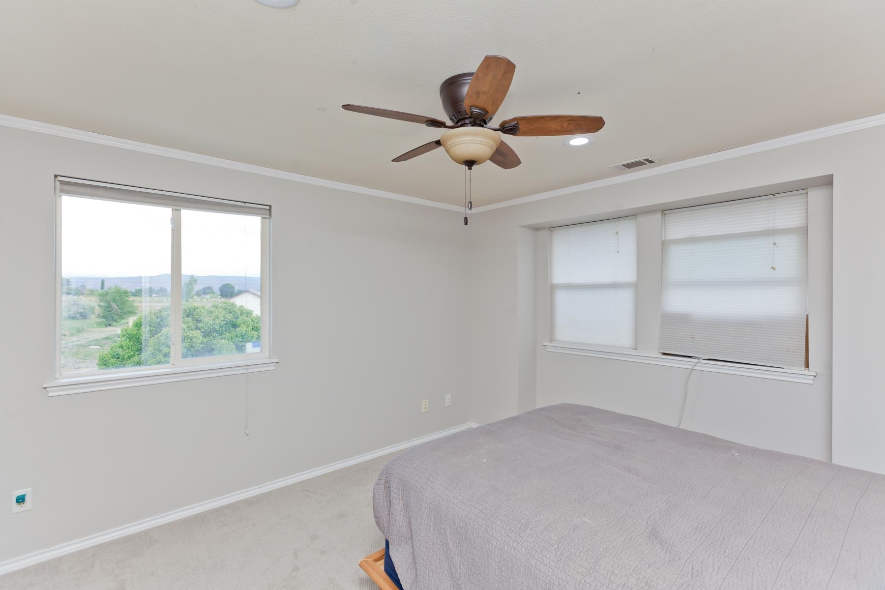 1815 O Road Fruita, CO 81521 - Photo 37 of 42 a view of empty room with window and ceiling fan