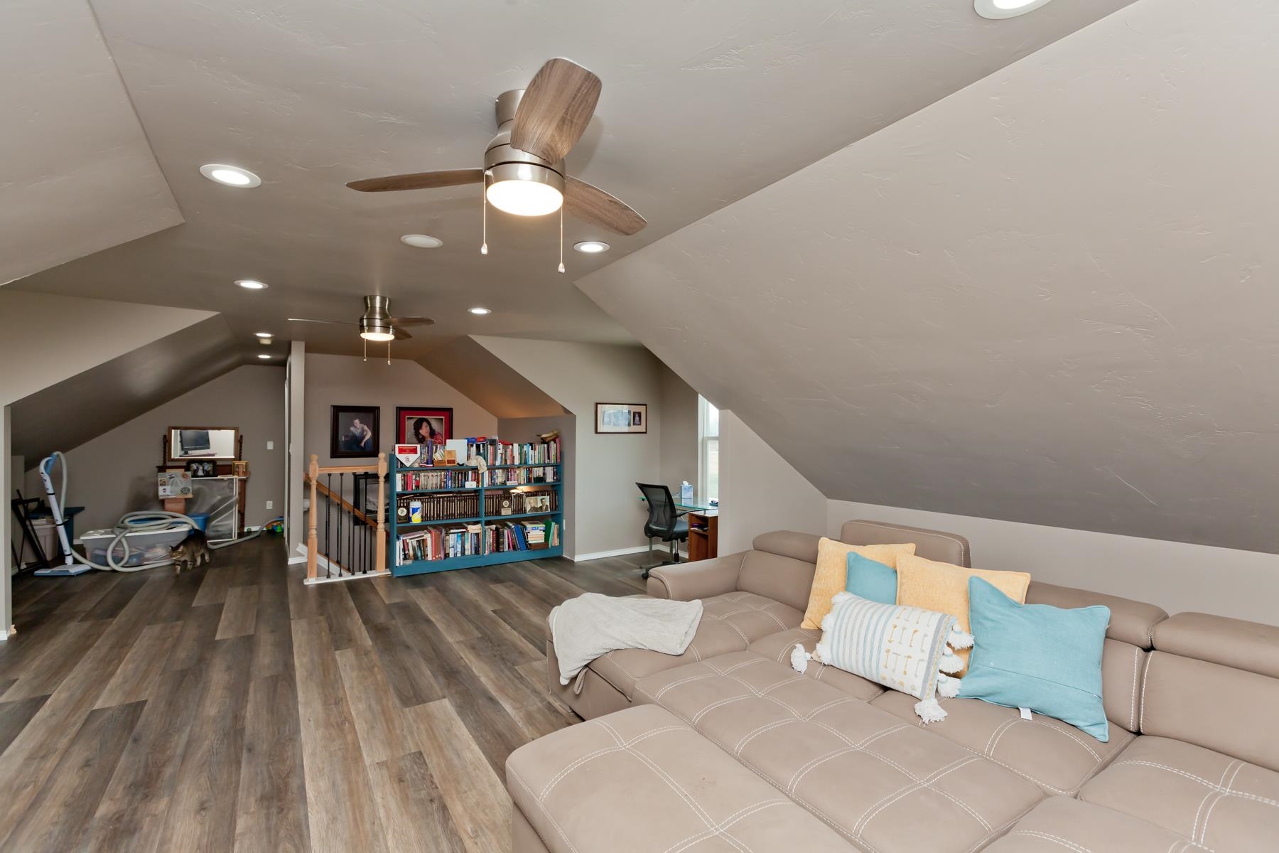 1815 O Road Fruita, CO 81521 - Photo 39 of 42 a living room with furniture and a wooden floor