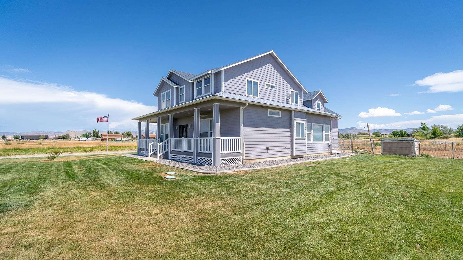 1815 O Road Fruita, CO 81521 - Photo 8 of 42 a view of a house with a swimming pool