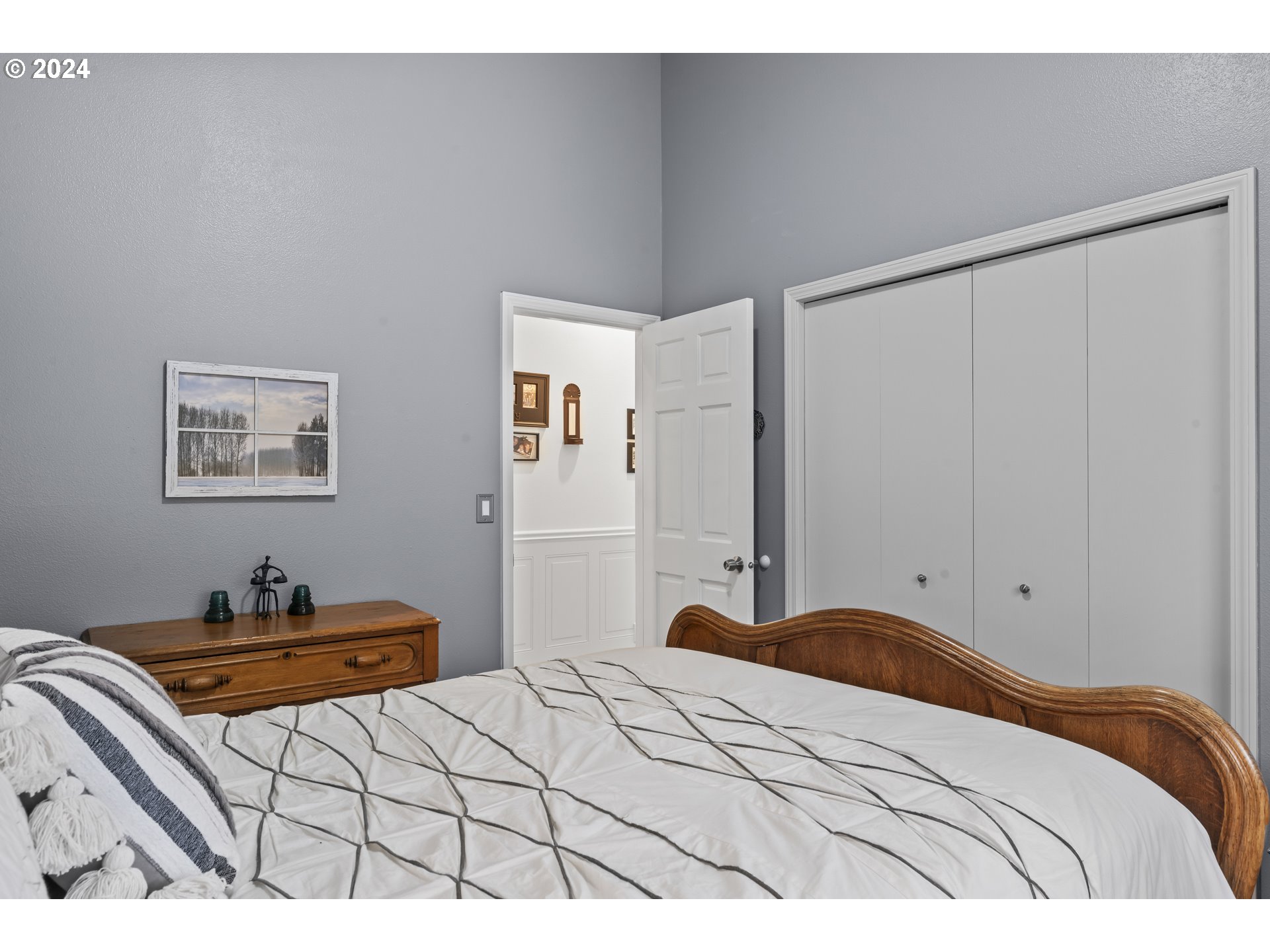 6737 Ivy Street Springfield, OR 97478 - Photo 26 of 48 a bedroom with a bed and a desk