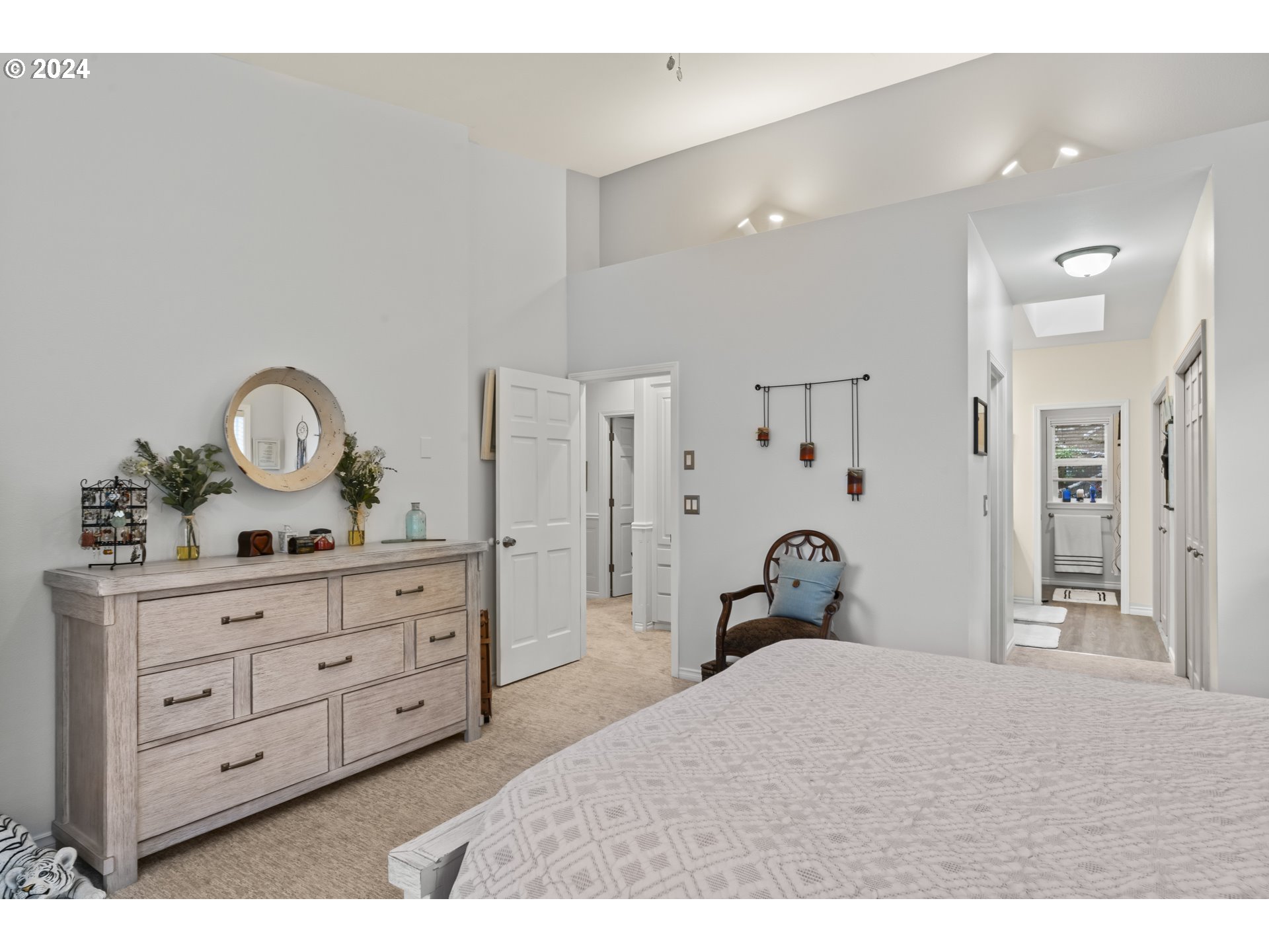 6737 Ivy Street Springfield, OR 97478 - Photo 33 of 48 a bedroom with a bed and a dresser