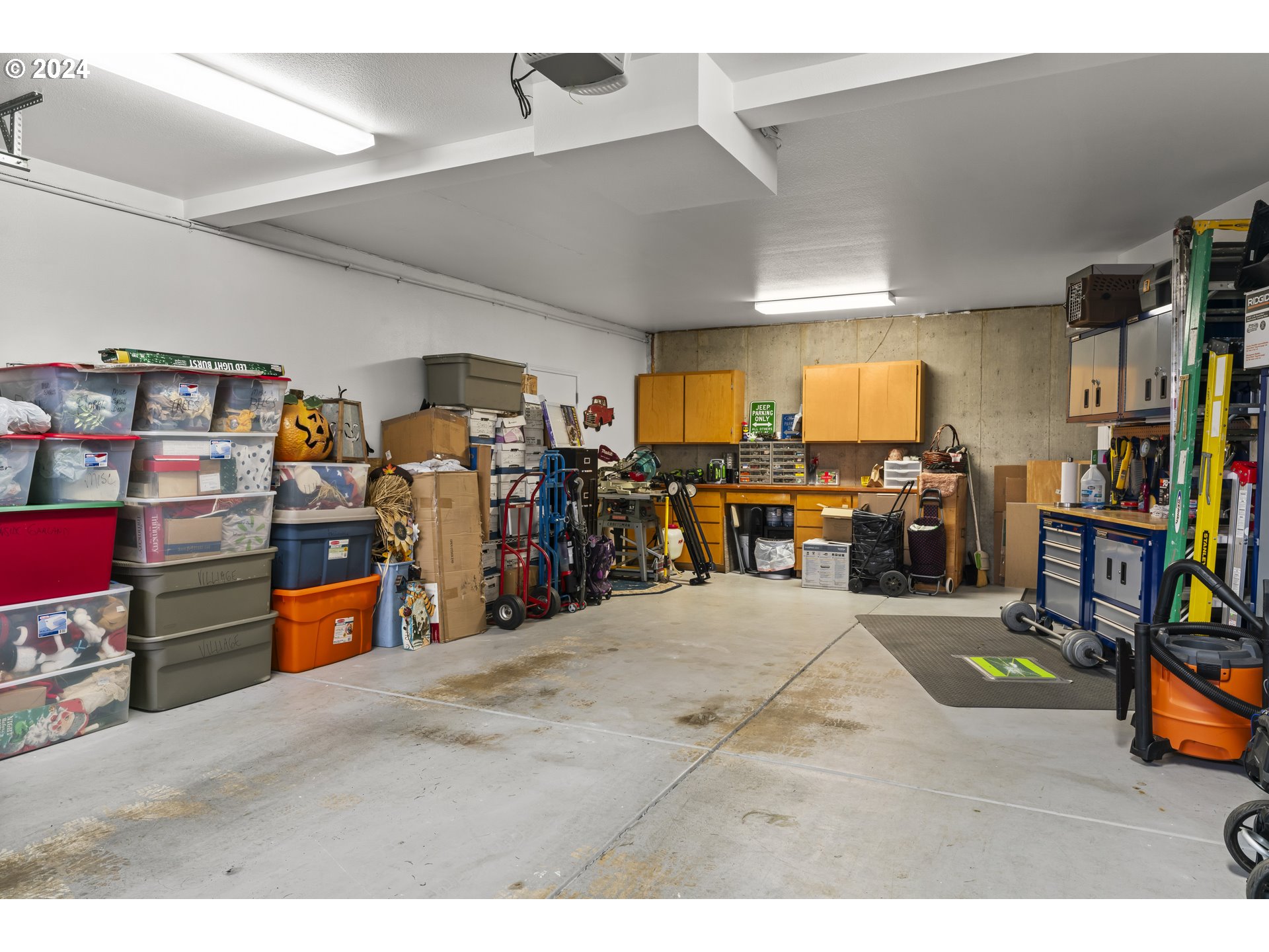 6737 Ivy Street Springfield, OR 97478 - Photo 44 of 48 a room with lots of storage and utility