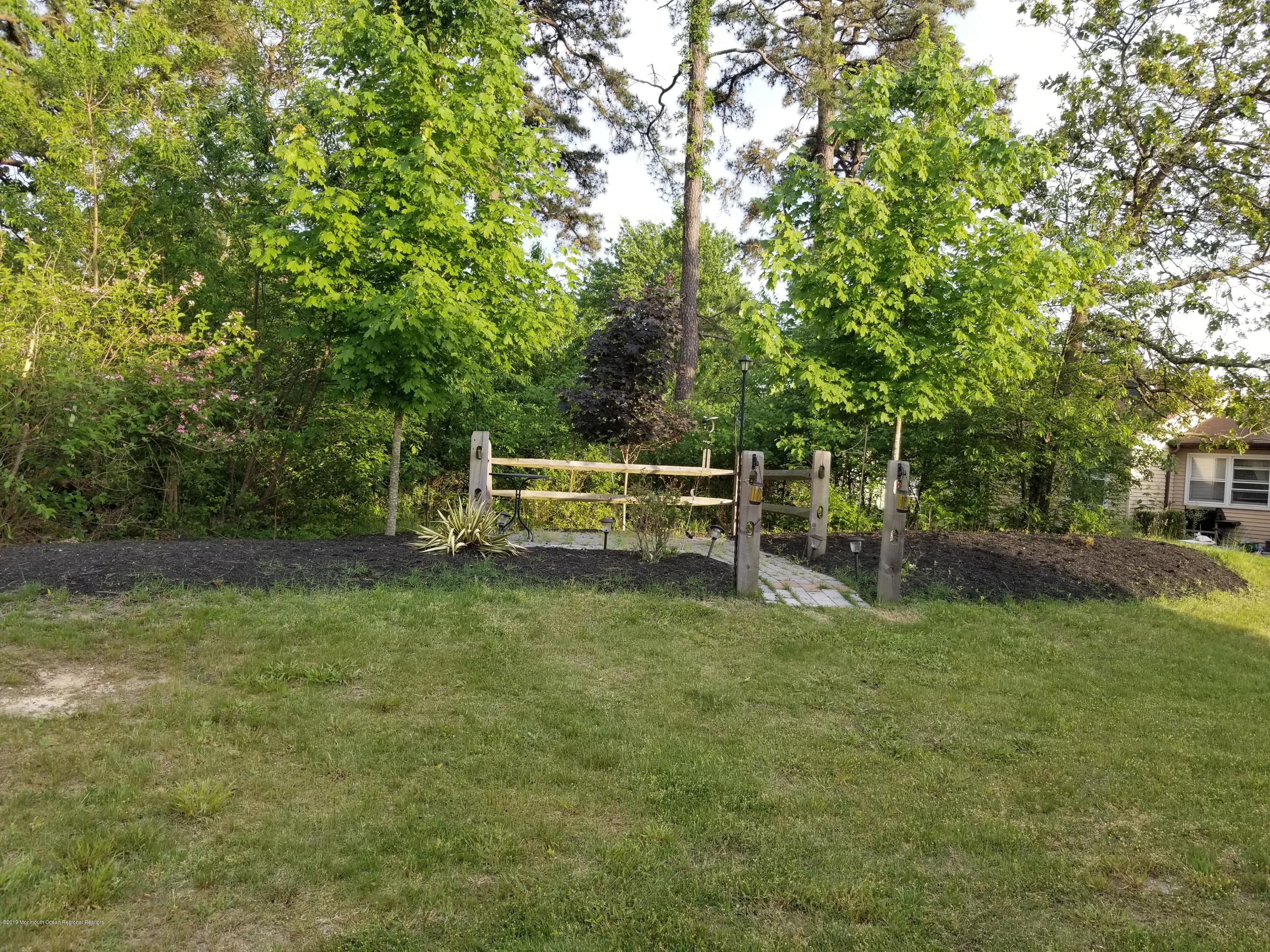 6 Berry Hill Road, Unit 72 Whiting, NJ 08759 - Photo 2 of 3 a view of a park with large trees