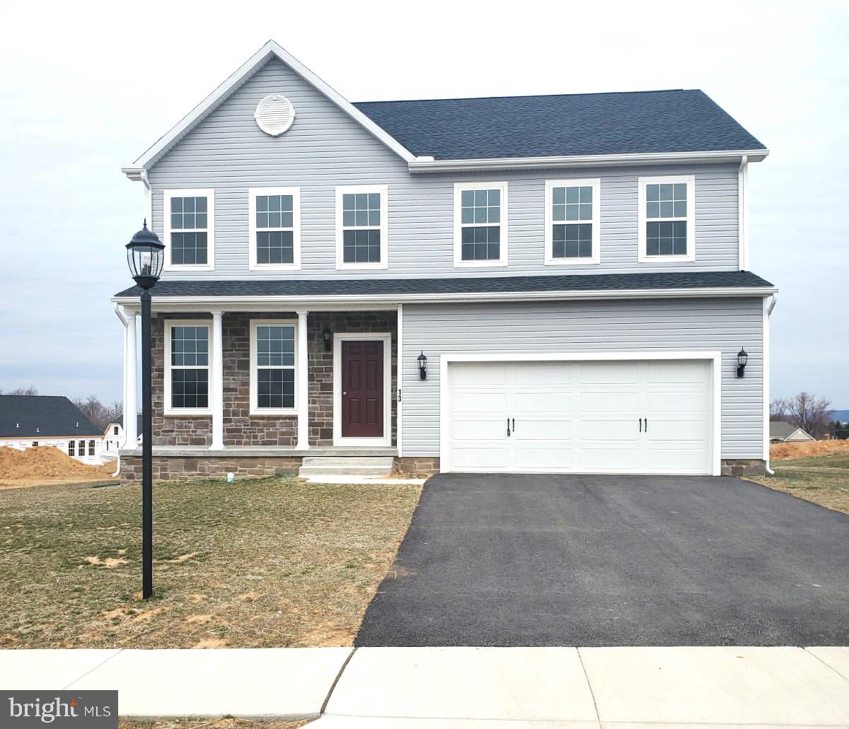65 Eagle Drive Hanover, PA 17331 - Photo 3 of 26 a front view of a house with a yard
