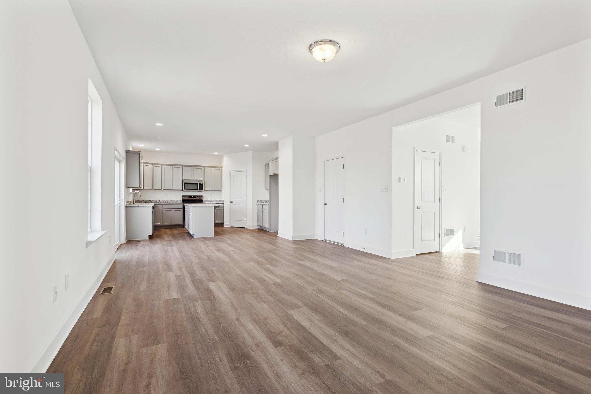 65 Eagle Drive Hanover, PA 17331 - Photo 8 of 26 a view of kitchen and hall with wooden floor