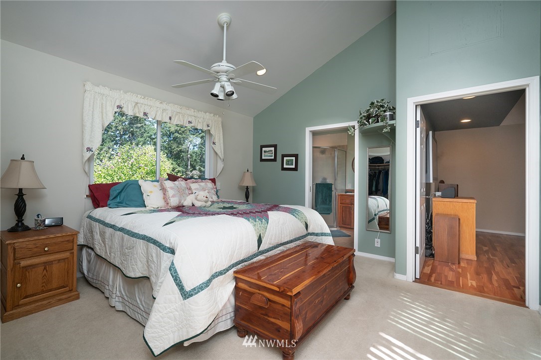 1976 Center Road Lopez Island, WA 98261 - Photo 16 of 26 a bedroom with bed and window