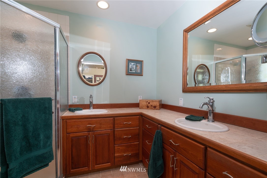 1976 Center Road Lopez Island, WA 98261 - Photo 17 of 26 a bathroom with a sink and a mirror