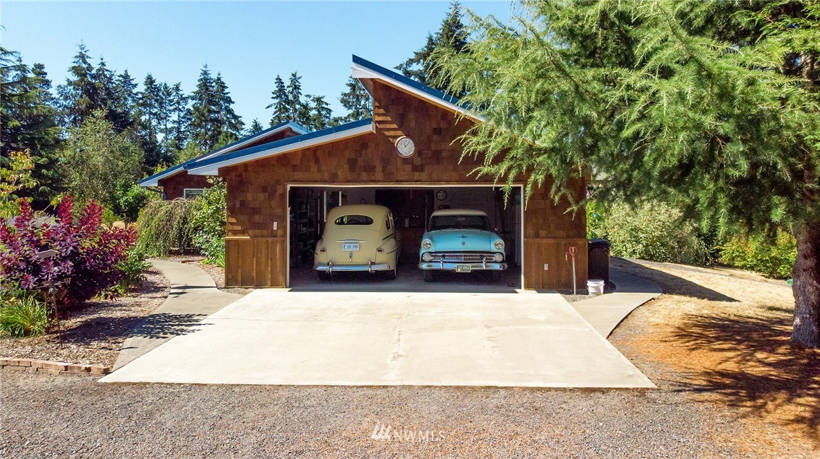 1976 Center Road Lopez Island, WA 98261 - Photo 4 of 26 a view of a car park in front of house