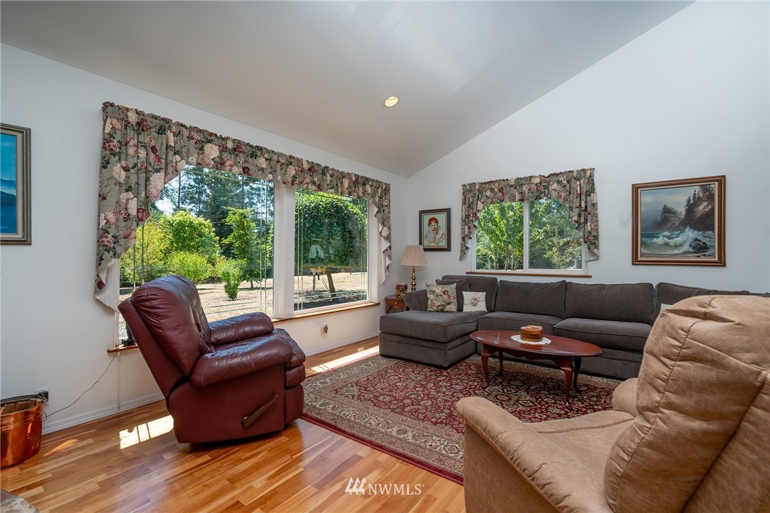 1976 Center Road Lopez Island, WA 98261 - Photo 8 of 26 a living room with furniture and a large window