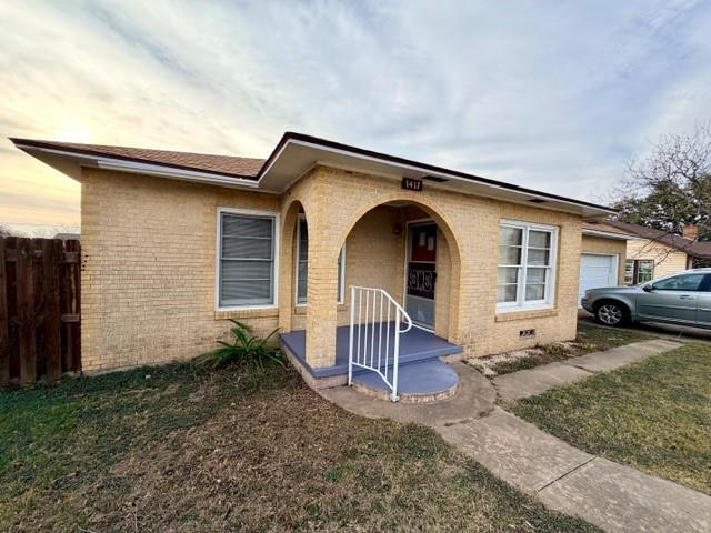 1417 Reynolds Street Goldthwaite, TX 76844 - Photo 3 of 21 a house view with a backyard space