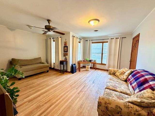 1417 Reynolds Street Goldthwaite, TX 76844 - Photo 5 of 21 a living room with furniture and a large window