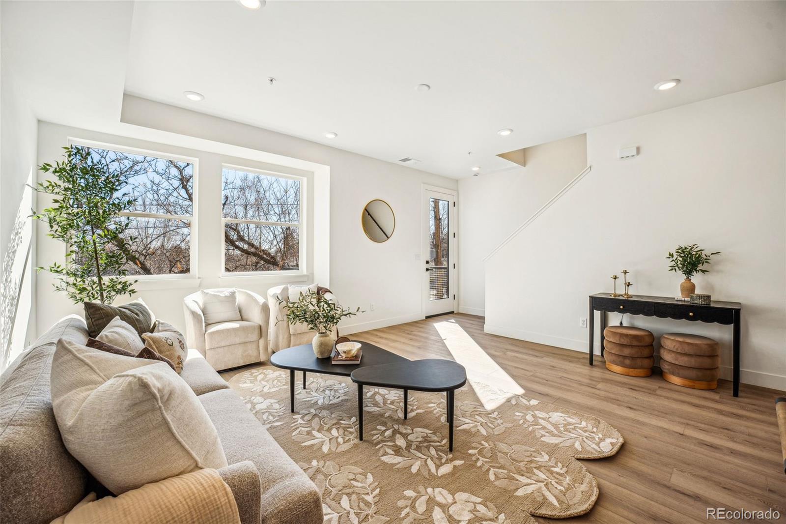 1416 Pierce Street Lakewood, CO 80214 - Photo 3 of 38 a living room with furniture and wooden floor